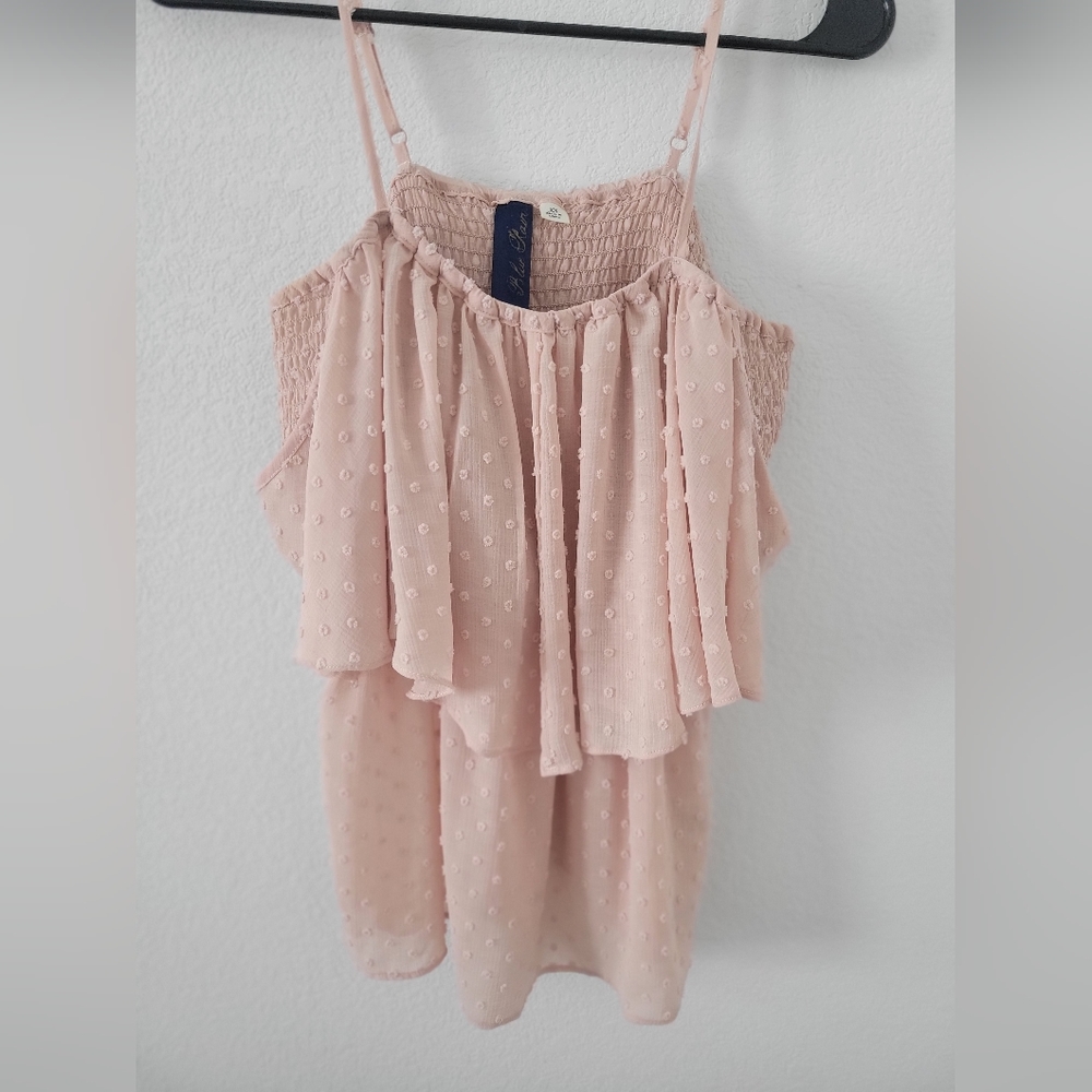 Womens pink textured top with off the shoulder sleeves.